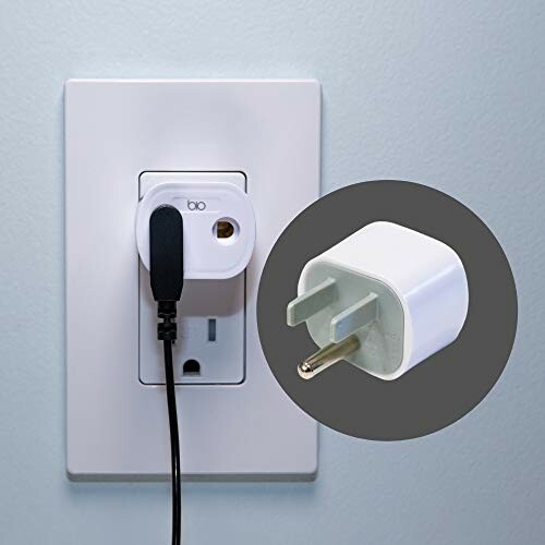 USB wall charger adapter plugged into outlet.